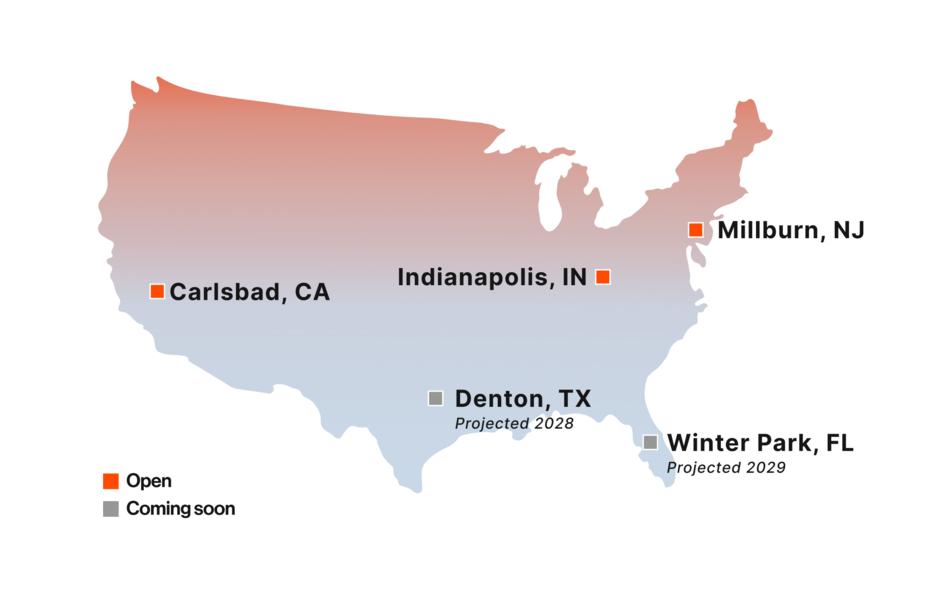 A map of Novartis RLT manufacturing sites in the US, including 3 currently operating: Millburn, NJ; Indianapolis, IN; and Carlsbad, CA; and 2 projected: Denton, TX; and Winter Park, FL.:
